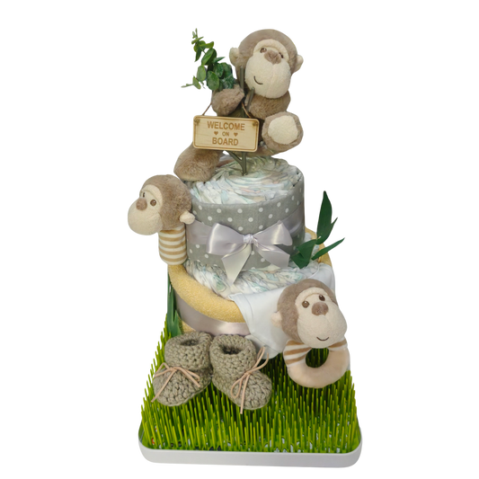 Cute cheeky monkey welcome nappy cake baby shower gift decorated with nappies ribbons and toy