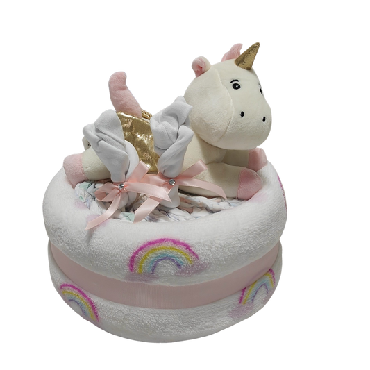 unicorn pink nappy cake baby girl gift with rolled nappies ribbons and plush unicorn toy