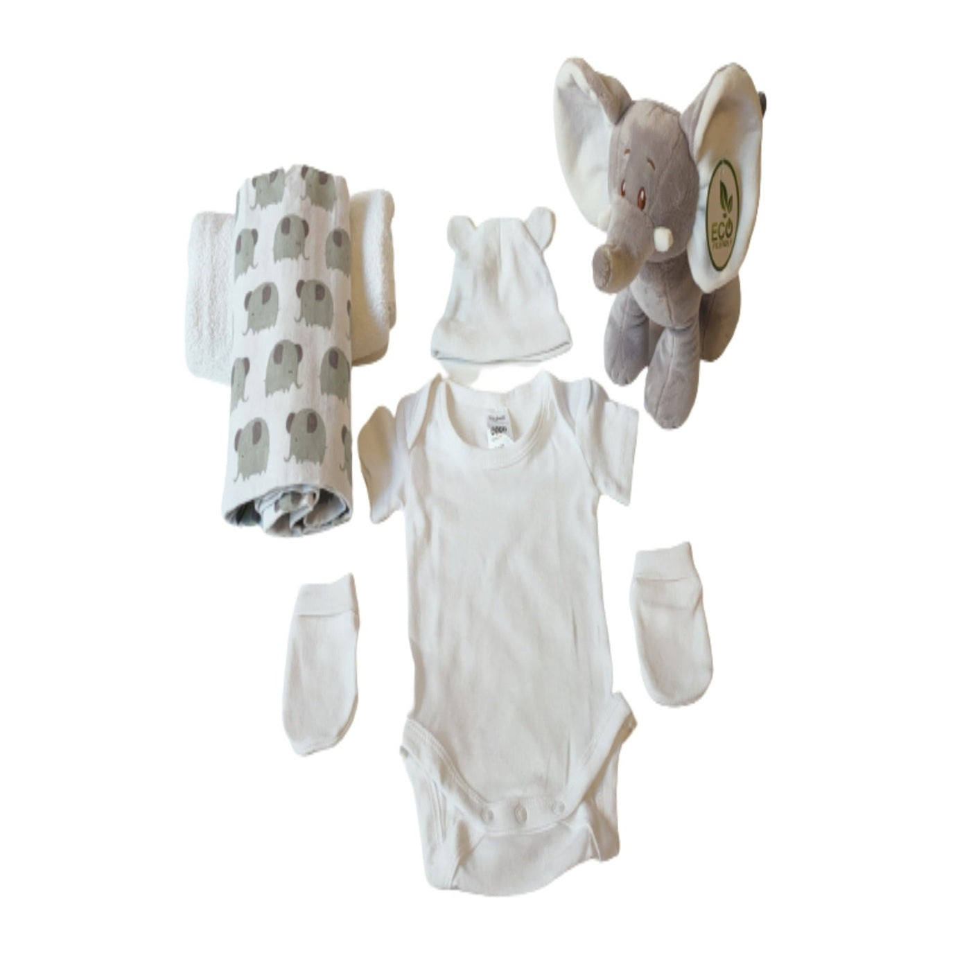 Flat lay of Ellie elephant 2-tier nappy cake components, including an eco-friendly plush toy, elephant print wrap, white infant bodysuit, beanie, and mittens.