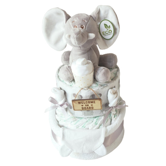 Ellie silver 2-tier baby elephant nappy cake gift set featuring an eco-friendly plush toy, wooden Welcome on Board sign, patterned muslin wrap, and silver ribbon trim.