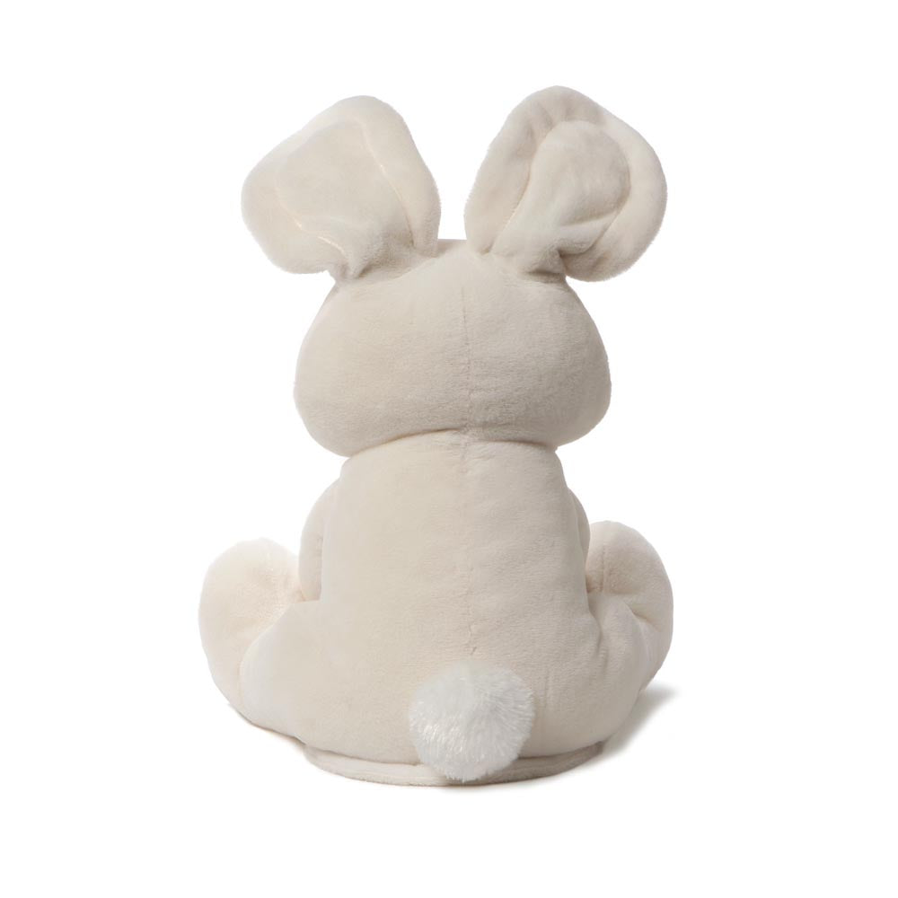 Back view of GUND Flora Bunny animated plush showing floppy ears and fluffy tail