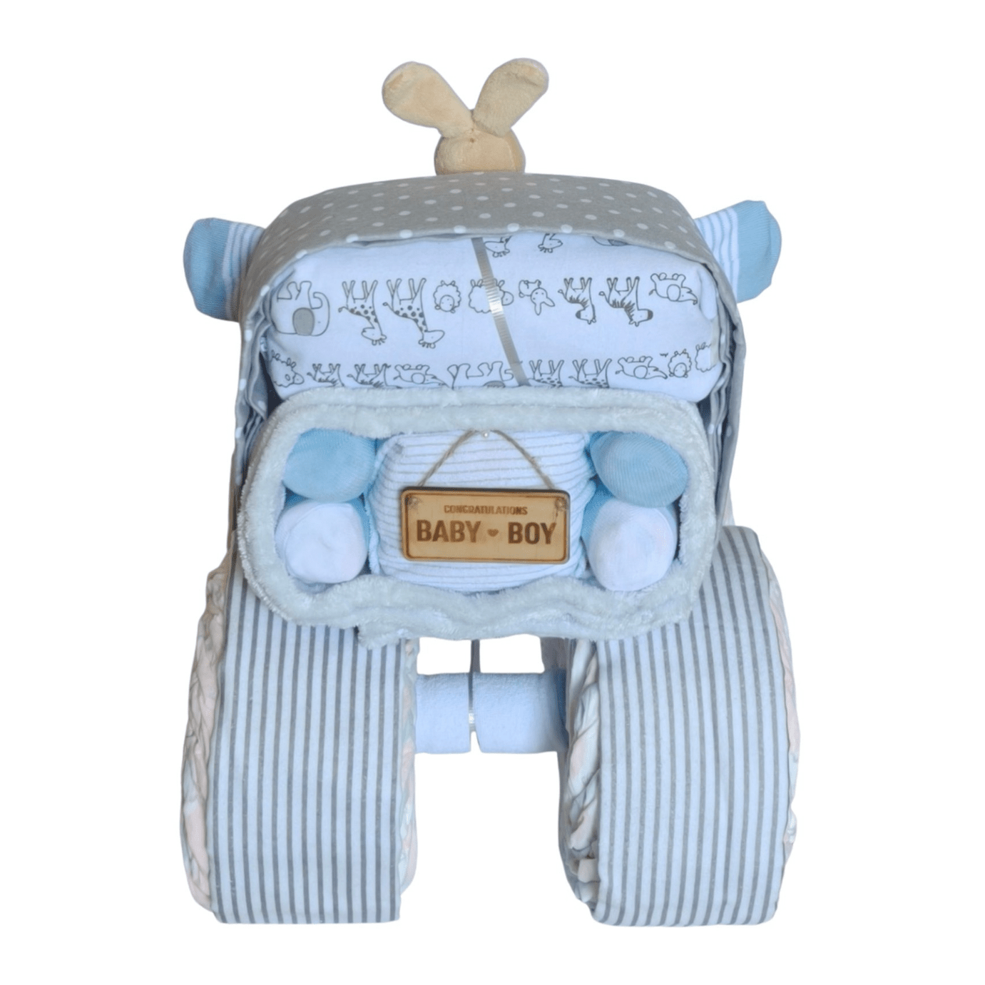 Back view of a blue baby boy truck nappy cake gift set showing striped wheels, a safari animal print wrap, and a wooden Baby Boy sign.