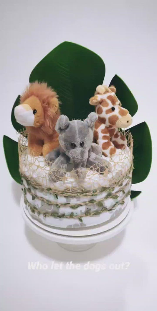 the zoo nappy cake baby gift with rolled nappies ribbons and assorted plush animal toys