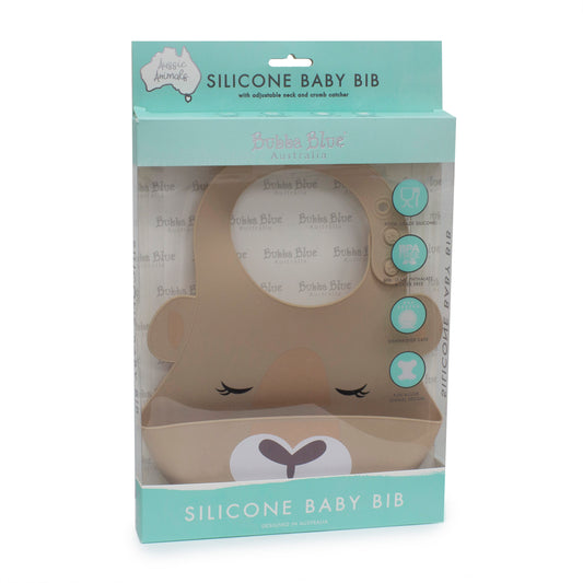 Bubba Blue Beige Aussie kangaroo-shaped silicone baby bib displayed inside its teal retail packaging - Nappie Cakes